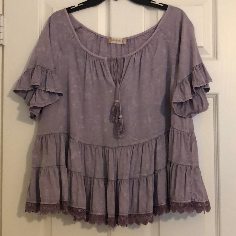 Light purple top with ruffles